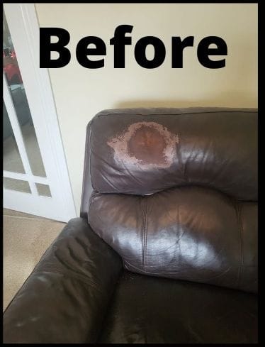 Brown leather sofa back with a circular burn mark exposing the layer beneath
